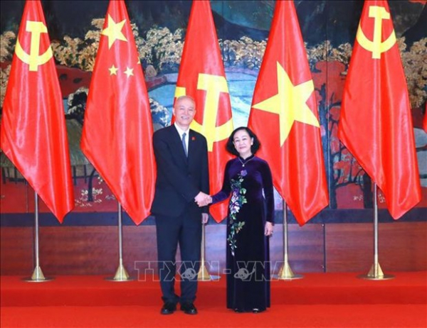 Vietnam gives top priority to developing ties with China: Party official -0