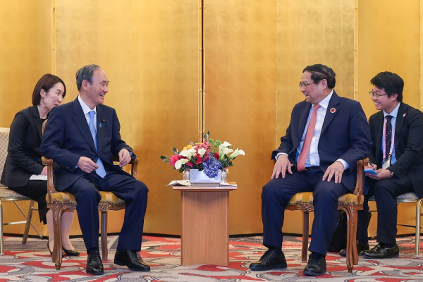 Government chief meets former Japanese PM -0