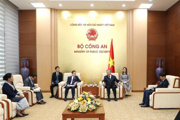 Minister To Lam receives Chief Representative of the Lao Ministry of Public Security in Vietnam -0