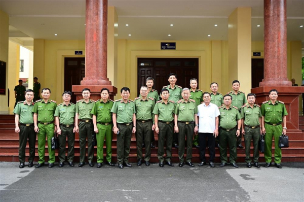 Minister To Lam works with Hai Phong Municipal Police Department -0