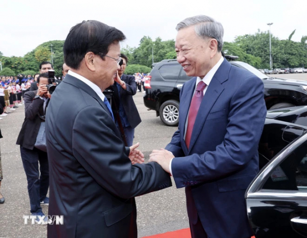 Lễ đón chính thức Chủ tịch nước Tô Lâm thăm cấp Nhà nước tới Lào -0