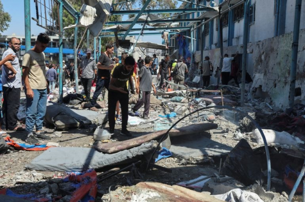 Israel dội bom liên tiếp, tấn công trường học LHQ tải Dải Gaza -0