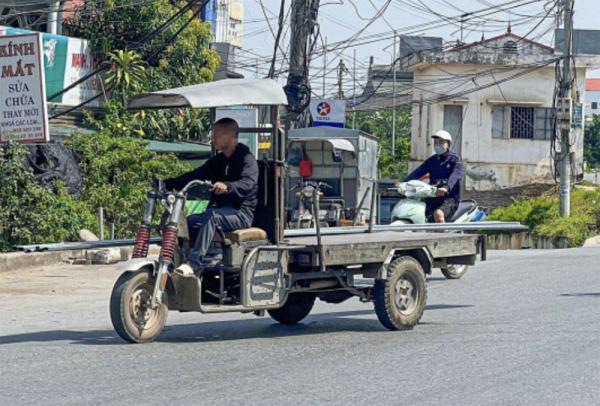 Nhiều giải pháp hỗ trợ người dân chuyển đổi phương tiện xe ba bánh -0