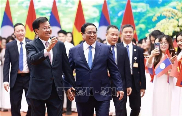 PM Pham Minh Chinh meets top leader of Laos -0