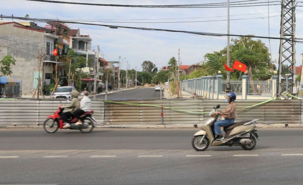 Vì sao nhiều dự án đường giao thông chưa thể đấu nối với QL1A? -0