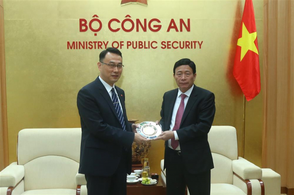 Deputy Minister Le Quoc Hung bids farewell to Chinese Ministry of Public Security’s Representative -0