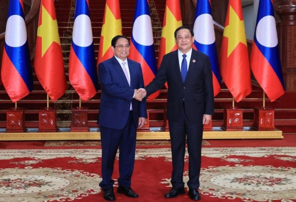 Vietnamese, Lao PMs meet ahead of ASEAN Summits -0