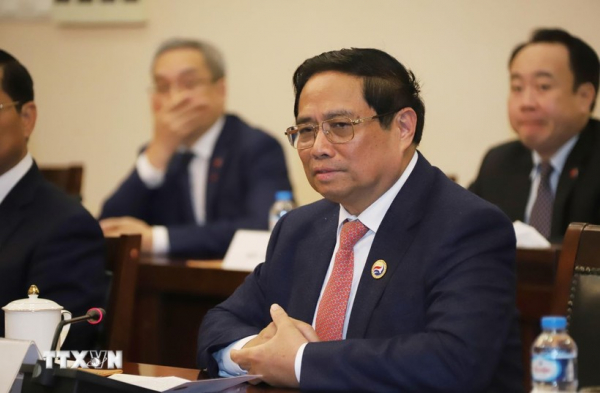Thủ tướng: Quan hệ hợp tác toàn diện Việt-Lào có một không hai trên thế giới -0