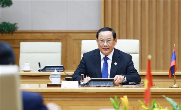 Thủ tướng Phạm Minh Chính gặp Thủ tướng Lào Sonexay Siphandone nhân Hội nghị thượng đỉnh P4G -0