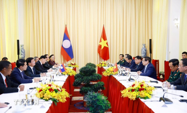 Thủ tướng Phạm Minh Chính tiếp Tổng Bí thư, Chủ tịch nước Lào -0