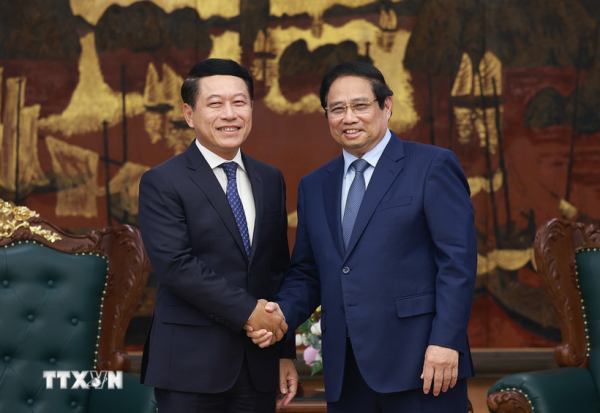 Thủ tướng: Việt Nam sẵn sàng trao đổi kinh nghiệm với Lào về tái cơ cấu doanh nghiệp -0
