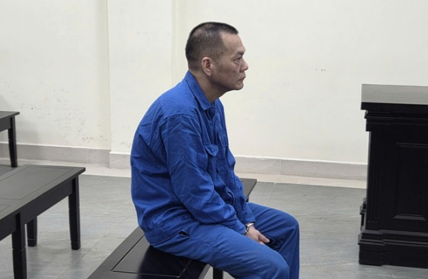 Đâm đồng nghiệp trọng thương, bị phạt 13 năm tù -0