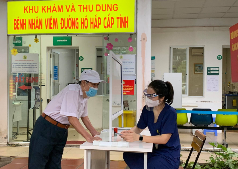 Người bệnh không phải trả phí xét nghiệm COVID-19 khi khám, chữa bệnh ở cơ sở y tế công lập -1