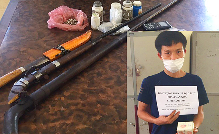 Cuộc đấu trí căng thẳng với đối tượng mua bán ma túy thủ 2 khẩu súng trốn trong rừng -0