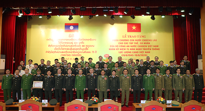 Đưa quan hệ hợp tác giữa hai Bộ Công an Việt - Lào lên tầm cao mới -0