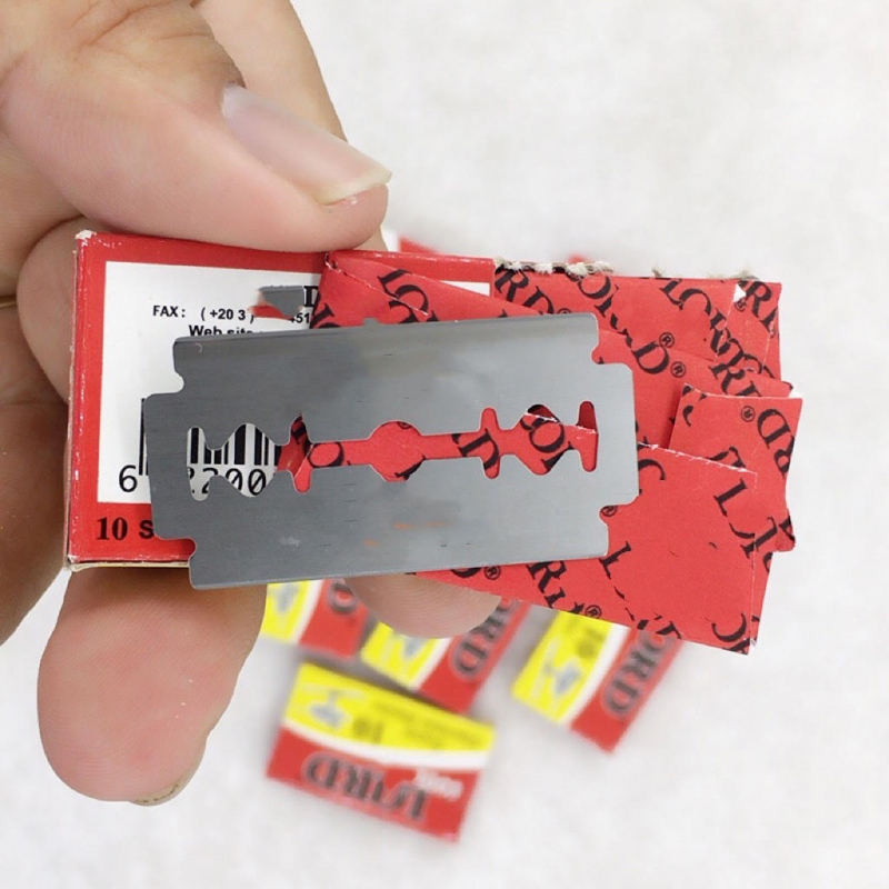 Mâu thuẫn tình cảm chồng dùng dao lam rạch mặt vợ  -0