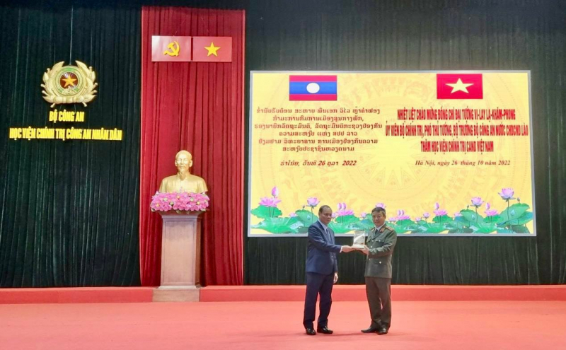 Phó Thủ tướng Chính phủ, Bộ trưởng Bộ Công an Lào thăm và làm việc tại Học viện Chính trị CAND -0