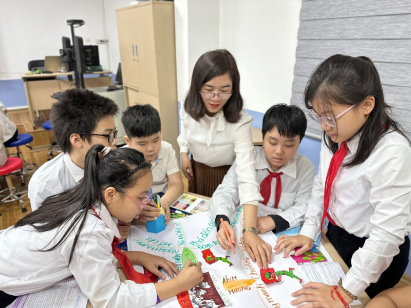 việc miễn học phí cho học sinh sẽ giúp giáo dục phát triển hiệu quả.jpg -2