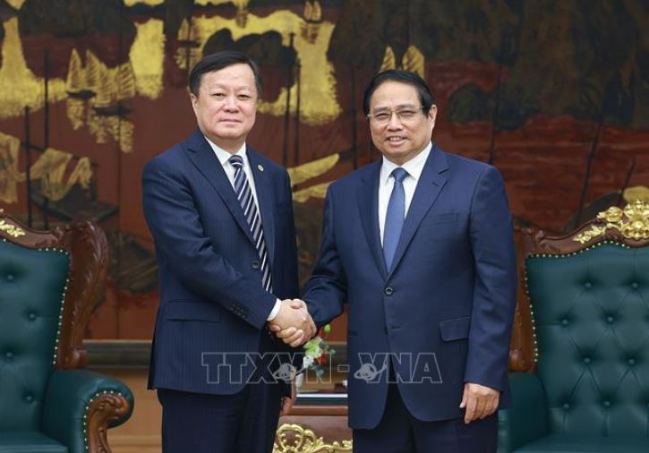 Thủ tướng Phạm Minh Chính tiếp Chủ tịch Tập đoàn tàu bay thương mại Trung Quốc -0