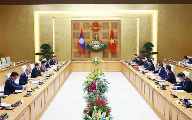 Thủ tướng Phạm Minh Chính gặp Thủ tướng Lào Sonexay Siphandone nhân Hội nghị thượng đỉnh P4G -0