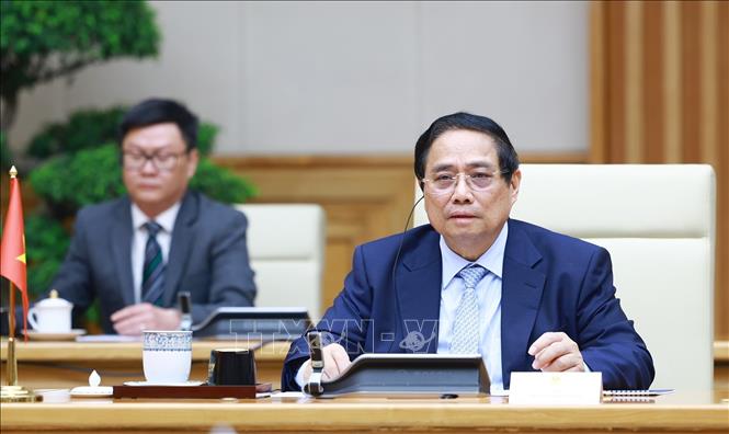 Thủ tướng Phạm Minh Chính gặp Thủ tướng Lào Sonexay Siphandone nhân Hội nghị thượng đỉnh P4G -0