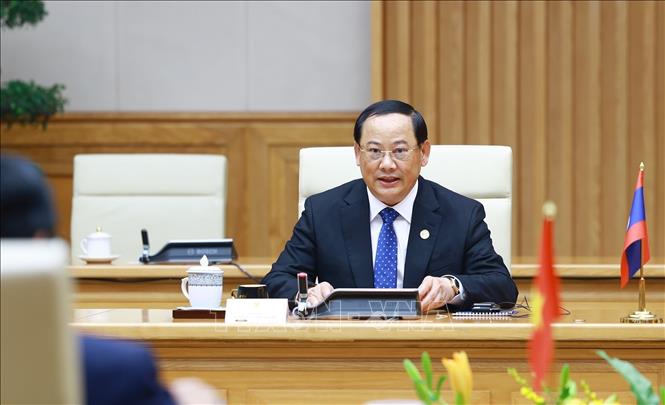 Thủ tướng Phạm Minh Chính gặp Thủ tướng Lào Sonexay Siphandone nhân Hội nghị thượng đỉnh P4G -0