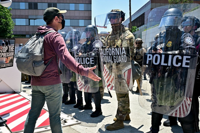 Los Angeles áp lệnh giới nghiêm, biểu tình lan rộng ở Mỹ -0