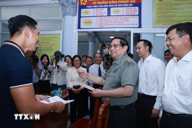 Thủ tướng: Tuyệt đối không để sắp xếp bộ máy ảnh hưởng đến đời sống nhân dân -0