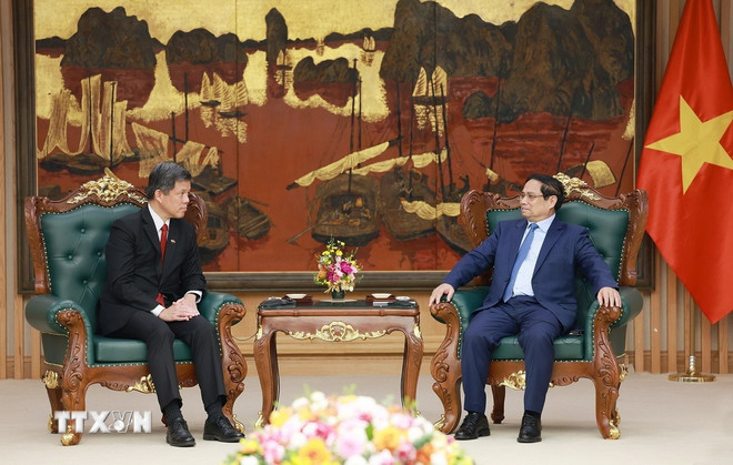 Thủ tướng tiếp Bộ trưởng Điều phối Dịch vụ công, Bộ trưởng Quốc phòng Singapore -0