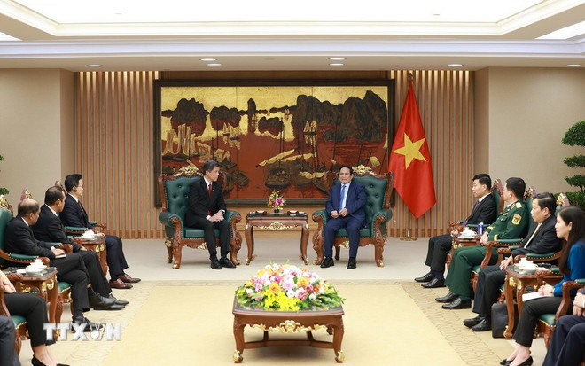 Thủ tướng tiếp Bộ trưởng Điều phối Dịch vụ công, Bộ trưởng Quốc phòng Singapore -0