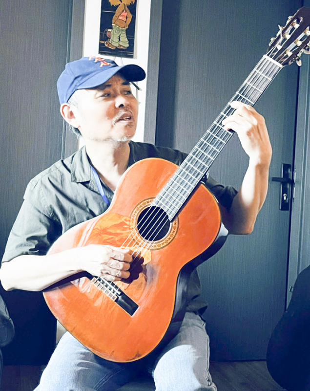 nh%3fc si truong hùng.jpg -0