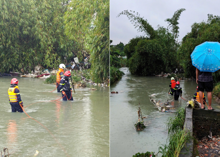 Tìm thấy thi thể nạn nhân và chiếc ô tô bị nước cuốn trôi -0