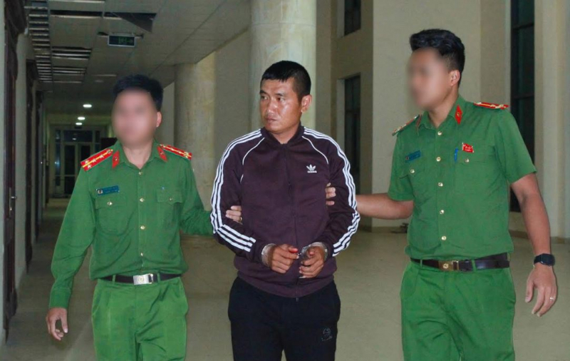 Dẫn giải kẻ bỏ lại 18 bánh heroin trốn sang Lào 6 năm trước -0