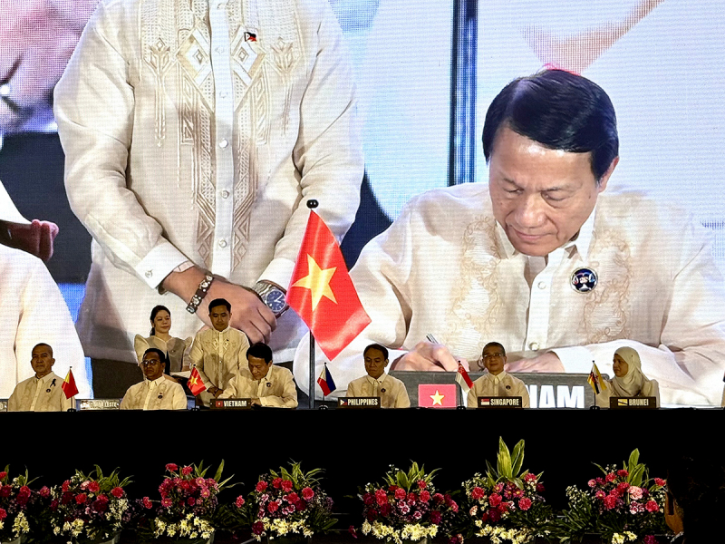 Bộ trưởng Lương Tam Quang dự Lễ ký Hiệp định ASEAN về dẫn độ -0