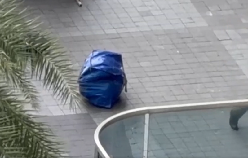 Điều tra vụ phát hiện thi thể giấu trong túi ở tòa nhà cao tầng -0