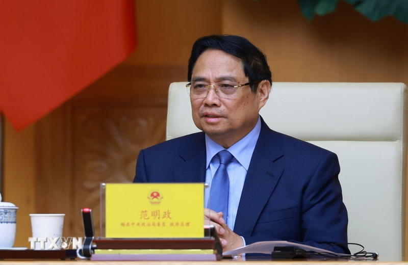 Thủ tướng Phạm Minh Chính tiếp Chủ tịch Khu tự trị dân tộc Choang Quảng Tây -0