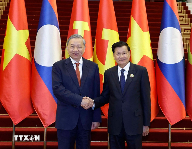 Chuyến thăm của Tổng Bí thư mở ra một chương mới, nâng tầm quan hệ Việt-Lào -0