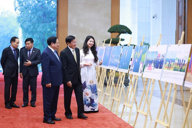 Prime Minister welcomes Lao Party General Secretary and President in Hanoi -0