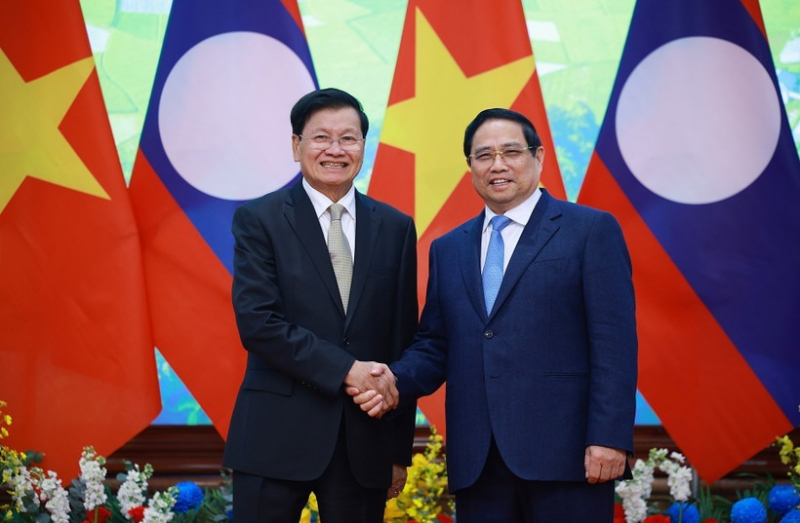 Prime Minister welcomes Lao Party General Secretary and President in Hanoi -0